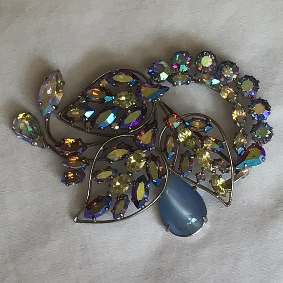 Jewelry - Vintage brooch with blue, yellow & clear stones with teardrop opalescent stone